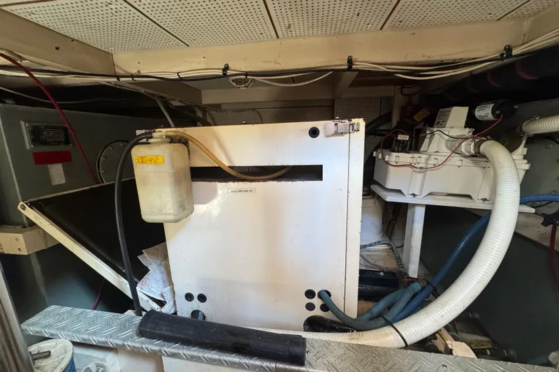 Good Enough Yacht Photos Pics Engine room of 1990 Grand Banks 46 Classic yacht with mechanical components.