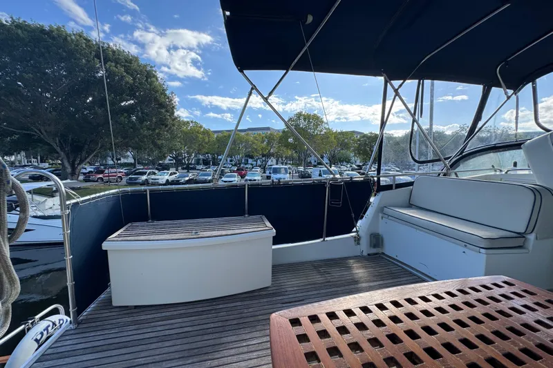 Good Enough Yacht Photos Pics Deck view of 1990 Grand Banks 46 Classic yacht with seating and storage.