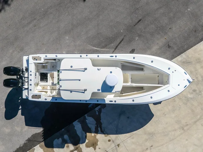 Pilar Yacht Photos Pics 2019 SeaVee 322z boat, aerial view, docked on concrete surface.