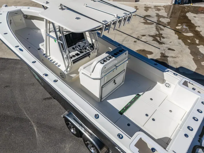 Pilar Yacht Photos Pics 2019 SeaVee 322z boat, aerial view, showcasing spacious deck and modern console.