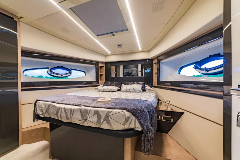 Bad Daddy Yacht Photos Pics Luxurious bedroom interior of 2018 Pershing 70 yacht with modern design.