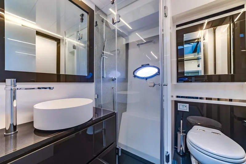 Bad Daddy Yacht Photos Pics Modern bathroom in 2018 Pershing 70 yacht with sleek fixtures and glass shower.