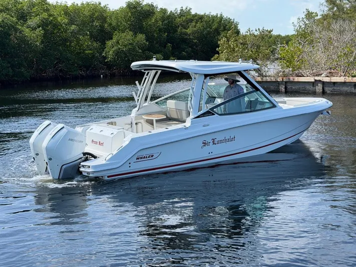  Yacht Photos Pics Boston Whaler 28 Vantage 2022 on calm water.