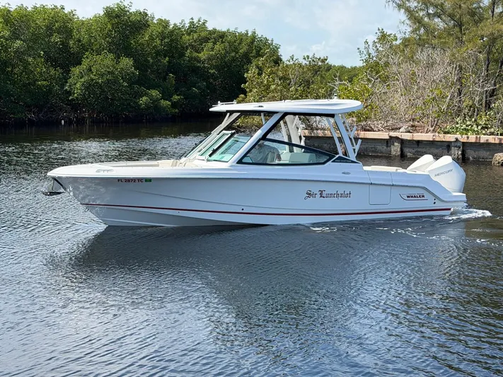  Yacht Photos Pics Boston Whaler 28 Vantage 2022 on calm water.