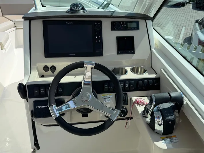  Yacht Photos Pics Boston Whaler 28 Vantage 2022 helm with Raymarine display.