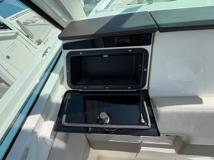 Yacht Photos Pics Boston Whaler 28 Vantage 2022, open storage compartment in cockpit.