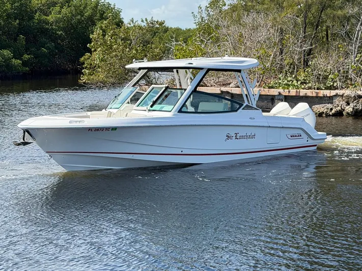  Yacht Photos Pics Boston Whaler 28 Vantage 2022 on calm water.