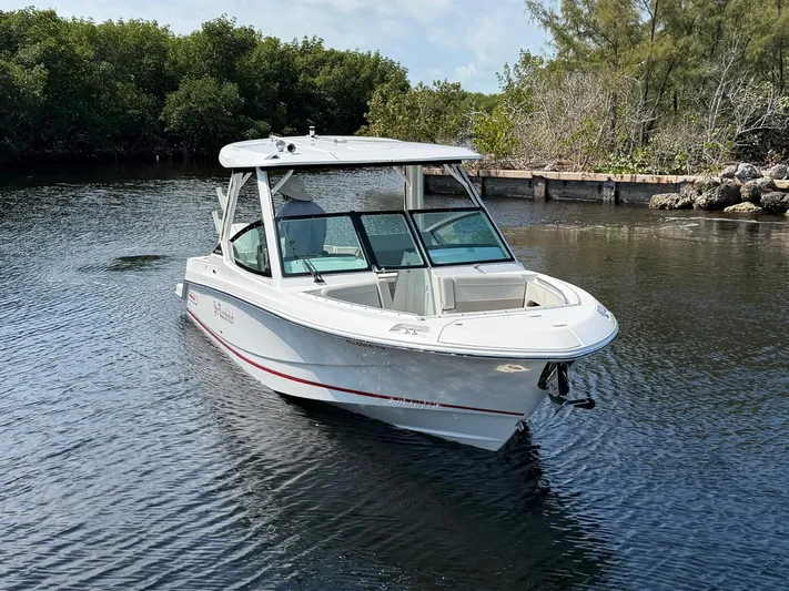  Yacht Photos Pics 2022 Boston Whaler 28 Vantage on calm water.