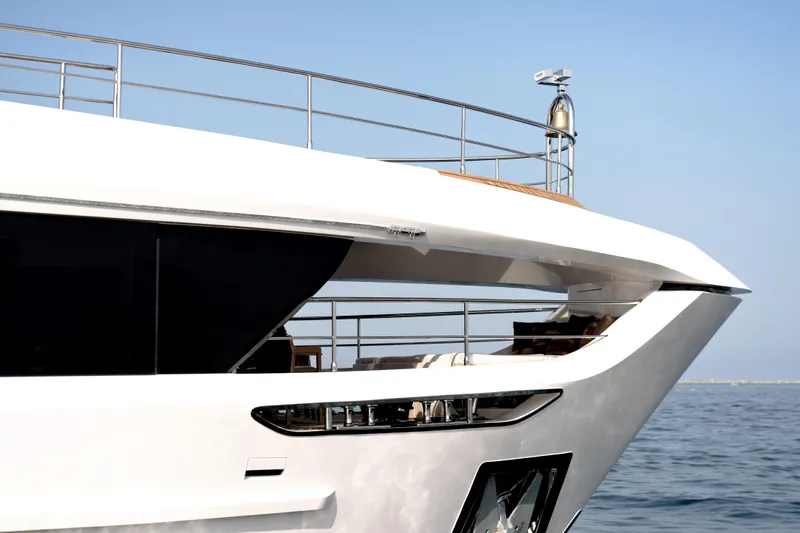  Yacht Photos Pics Luxury Majesty 100 Terrace yacht, 2027 model, cruising on calm blue waters.