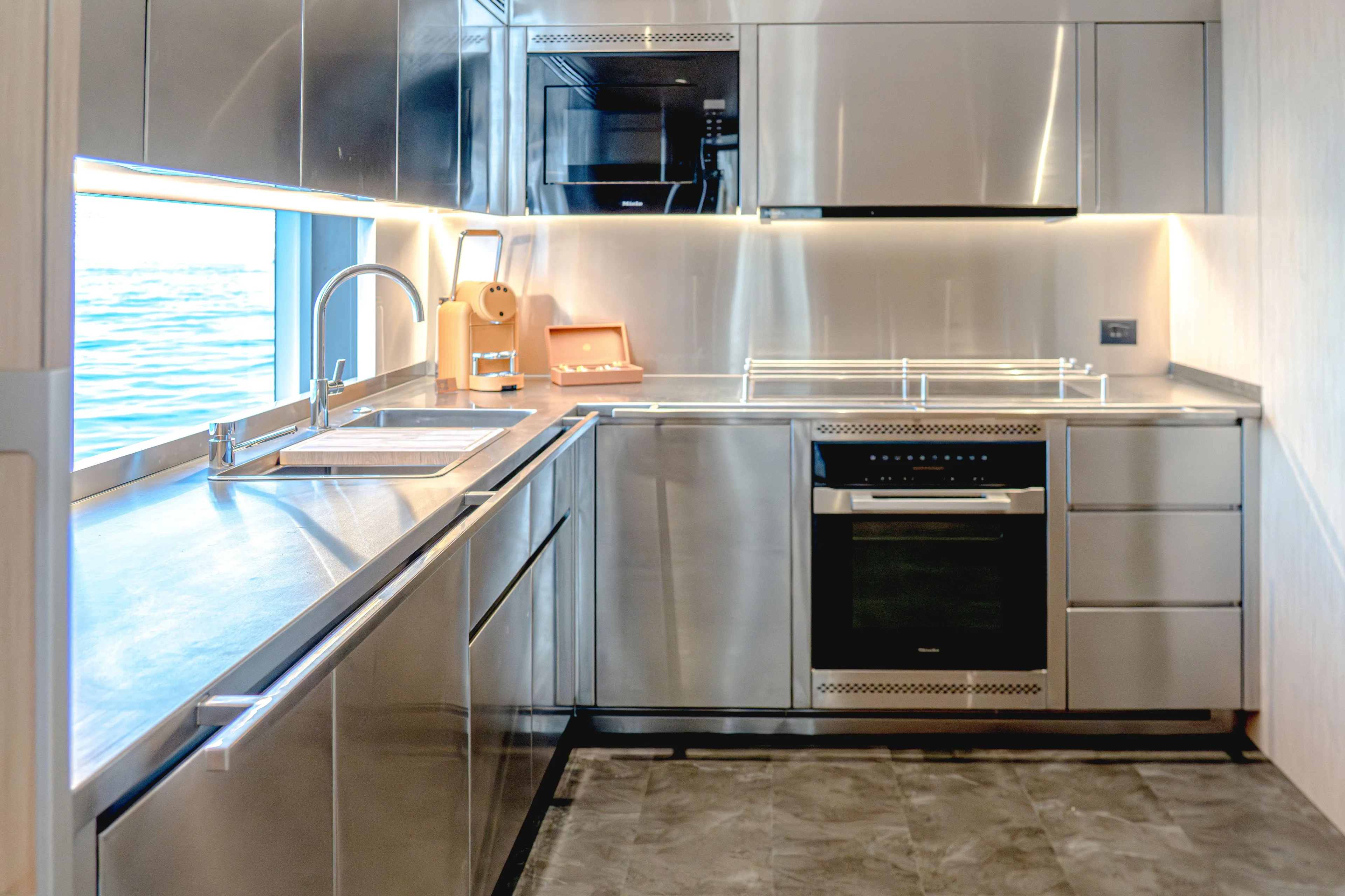  Yacht Photos Pics Modern kitchen interior on Majesty 100 Terrace yacht, 2027 model, with stainless steel appliances.