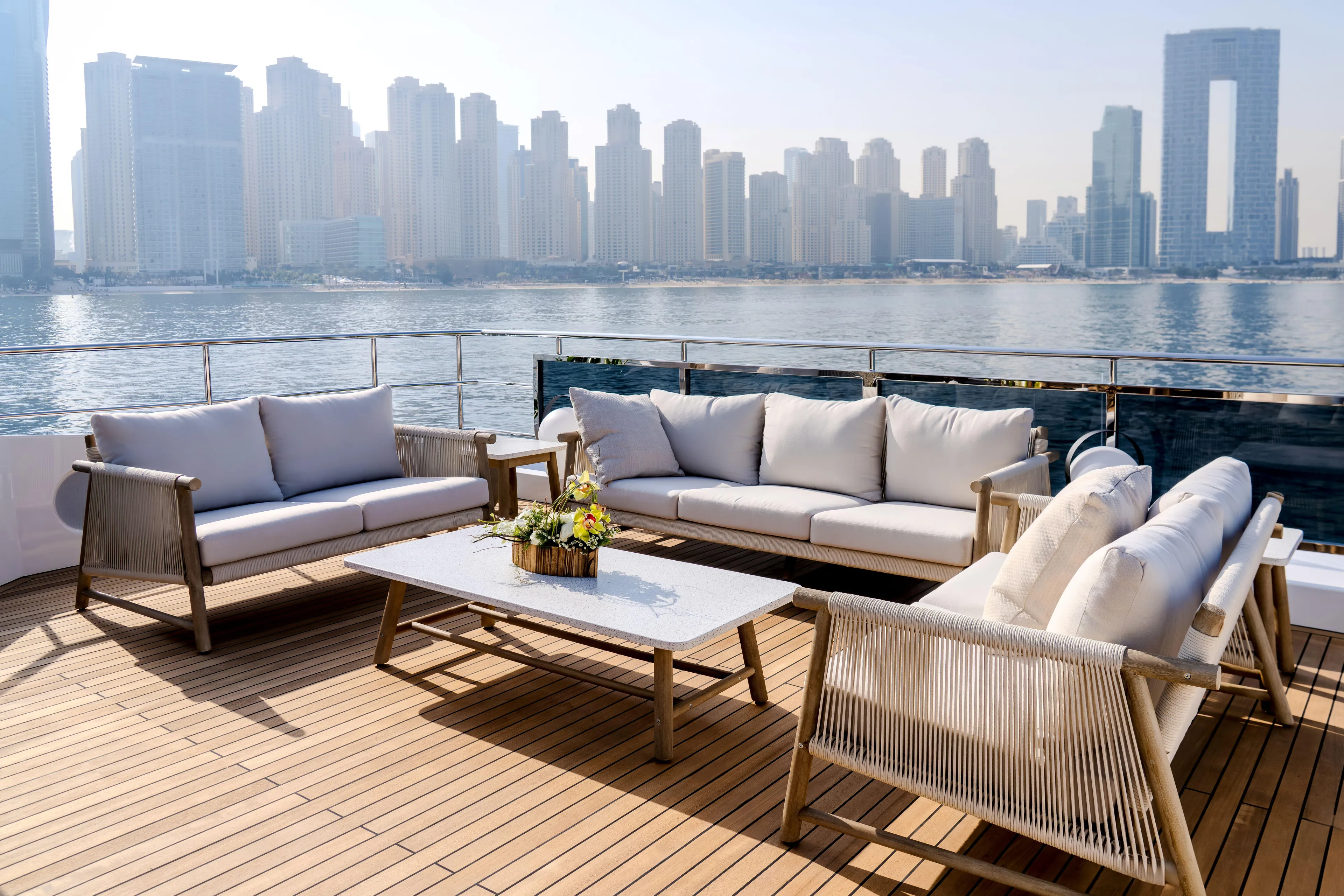  Yacht Photos Pics Luxurious Majesty 100 Terrace yacht deck with elegant seating, city skyline view, 2027 model.