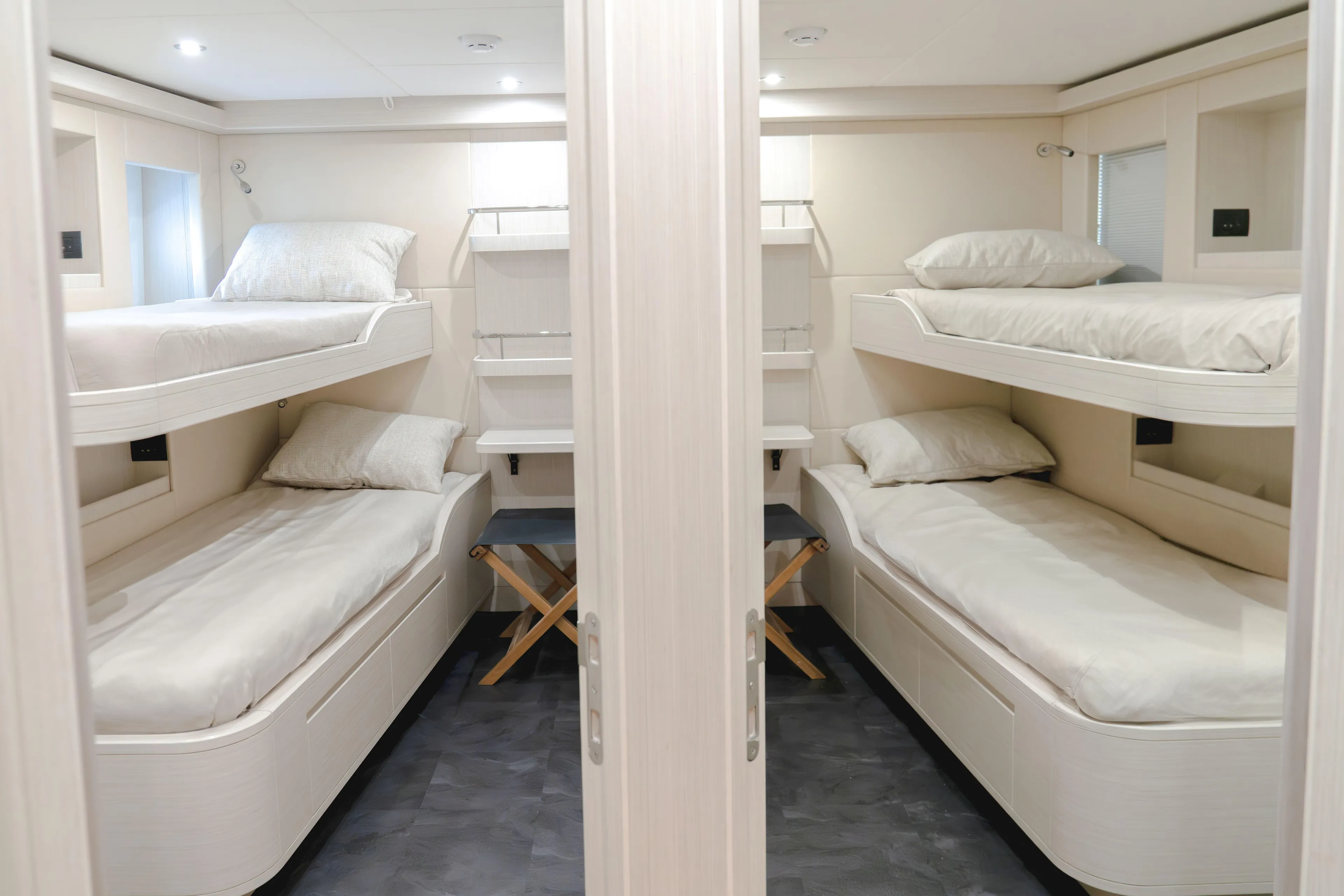  Yacht Photos Pics Luxurious 2027 Majesty 100 Terrace yacht cabin with modern bunk beds and elegant design.