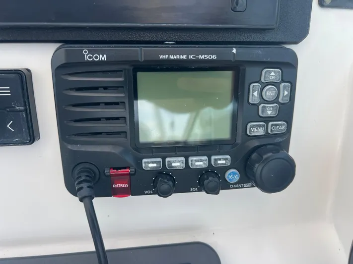  Yacht Photos Pics Icom VHF Marine IC-M506 radio on 2007 Topaz 32 Express boat dashboard.