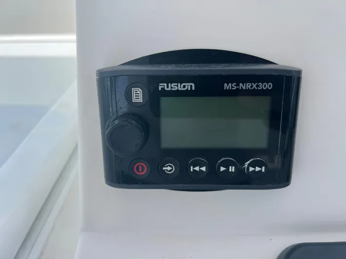  Yacht Photos Pics Fusion MS-NRX300 marine stereo controller on 2007 Topaz 32 Express boat.