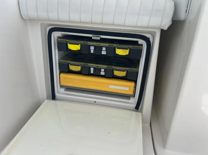  Yacht Photos Pics Storage compartment with organized toolboxes on a 2007 Topaz 32 Express boat.