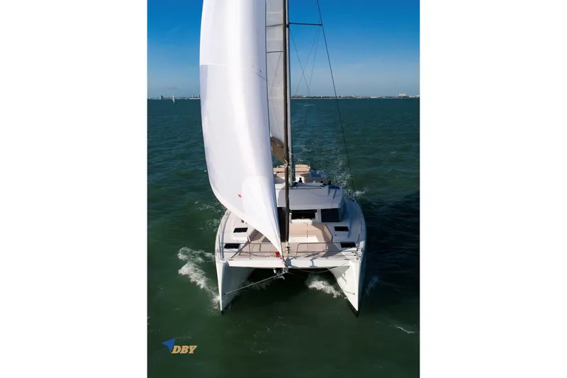 Ellidy Yacht Photos Pics Sailing catamaran Bali 4.4, 2025 model, cruising on open sea under clear blue sky.