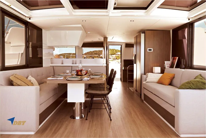 Ellidy Yacht Photos Pics Luxurious interior of 2025 Bali 4.4 yacht with elegant dining area and modern decor.