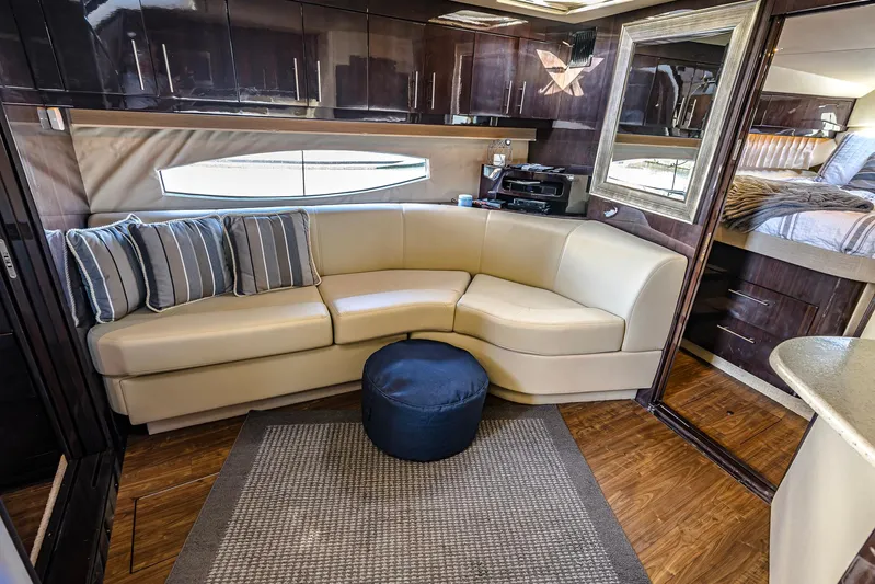  Yacht Photos Pics Interior of 2016 Regal 46 Sport Coupe with leather seating and modern decor.