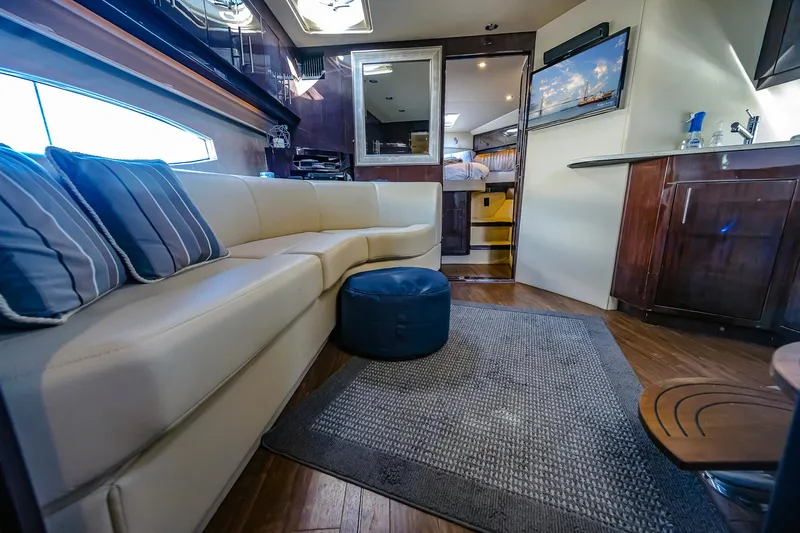  Yacht Photos Pics Luxurious interior of 2016 Regal 46 Sport Coupe yacht with modern furnishings.