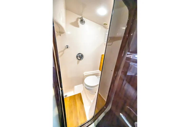  Yacht Photos Pics Bathroom interior of 2016 Regal 46 Sport Coupe yacht, featuring modern fixtures.