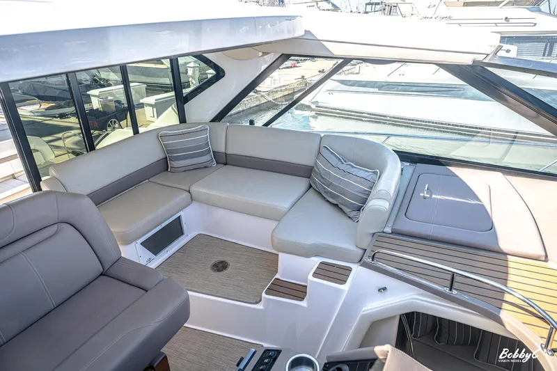  Yacht Photos Pics Luxurious seating area on a 2016 Regal 46 Sport Coupe yacht.