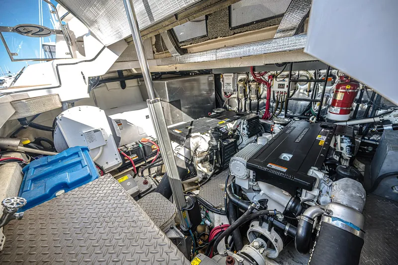  Yacht Photos Pics Engine room of 2016 Regal 46 Sport Coupe, showcasing mechanical components and systems.