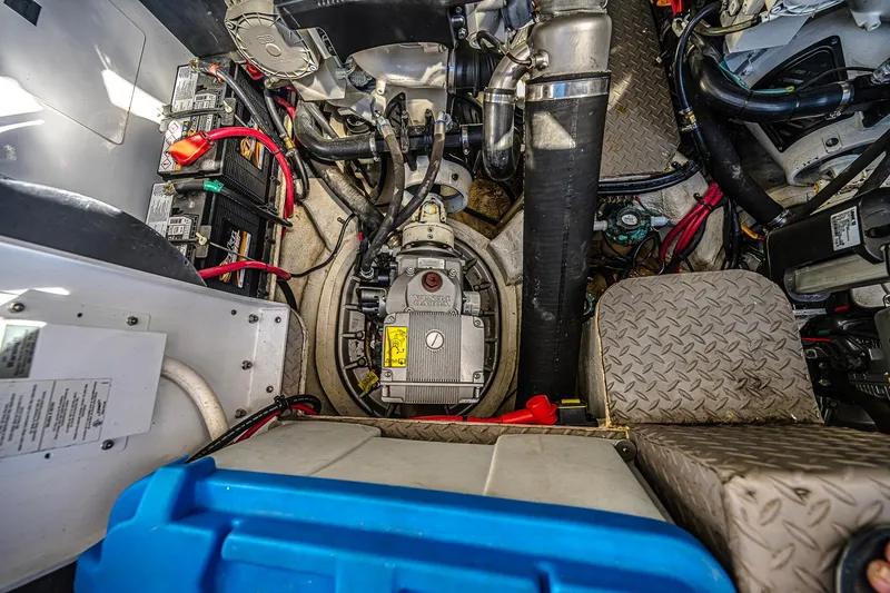  Yacht Photos Pics Engine room of 2016 Regal 46 Sport Coupe with visible batteries and mechanical components.