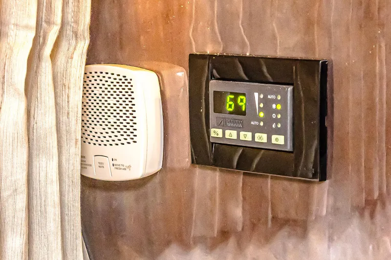  Yacht Photos Pics Thermostat and speaker on 2016 Regal 46 Sport Coupe interior wall.