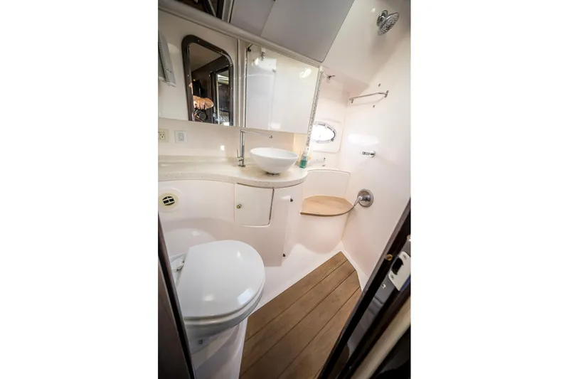  Yacht Photos Pics Luxurious bathroom in 2016 Regal 46 Sport Coupe yacht with modern fixtures.