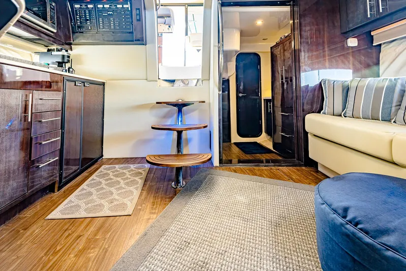  Yacht Photos Pics Luxurious interior of 2016 Regal 46 Sport Coupe yacht with modern furnishings.