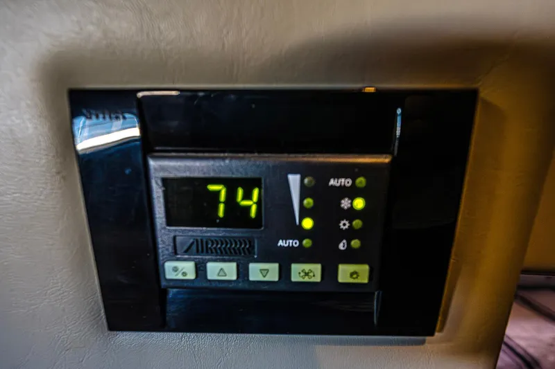  Yacht Photos Pics Thermostat control panel in 2016 Regal 46 Sport Coupe displaying 74 degrees.