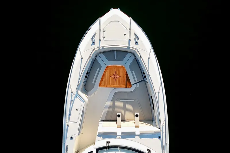  Yacht Photos Pics 2024 Boston Whaler 380 Realm boat, aerial view of bow with teak accents.
