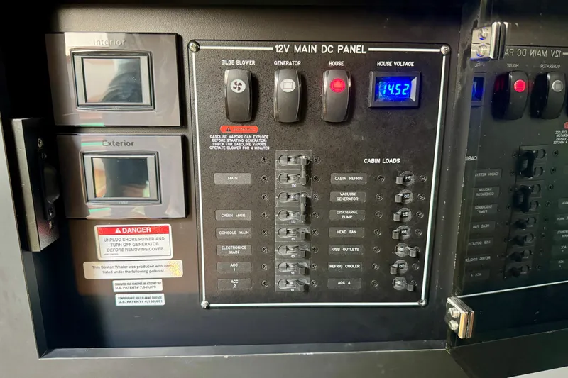  Yacht Photos Pics 2024 Boston Whaler 380 Realm 12V main DC panel with switches and voltage display.