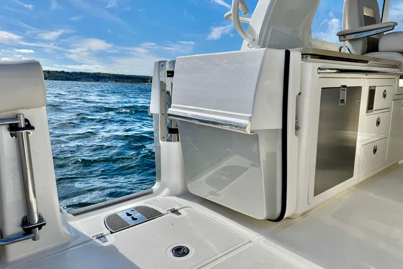  Yacht Photos Pics 2024 Boston Whaler 380 Realm boat interior with open deck and ocean view.