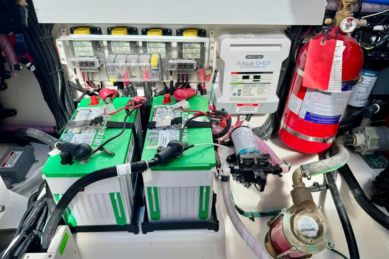  Yacht Photos Pics Electrical system of 2024 Boston Whaler 380 Realm with batteries and fire extinguisher.