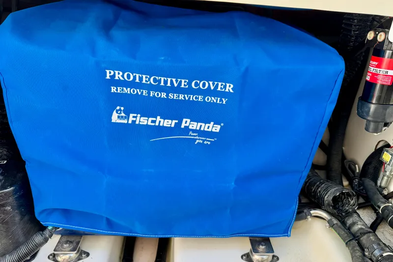  Yacht Photos Pics Blue Fischer Panda protective cover on 2024 Boston Whaler 380 Realm boat.