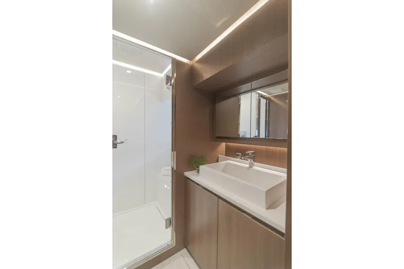 Savoir Faire Yacht Photos Pics Modern bathroom in 2025 MCP Global Exp 68 yacht with sleek design and elegant fixtures.