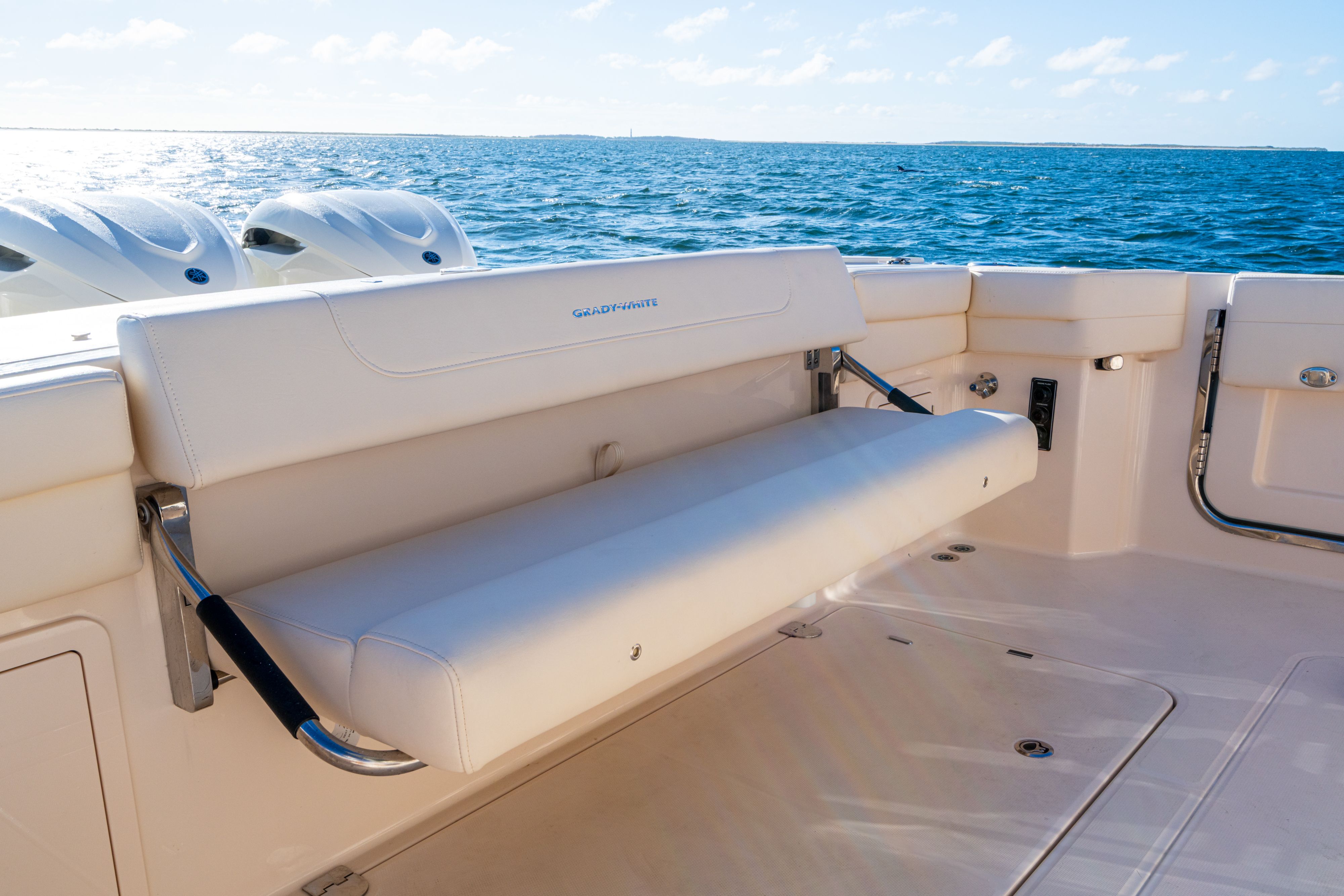 Grady-White 340EXP 2026 boat with seating and ocean view.