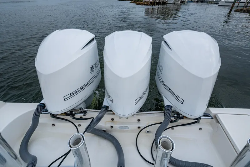 Bottoms Up II Yacht Photos Pics Triple Yamaha outboard engines on a 2009 Pursuit OS 375 Offshore boat.