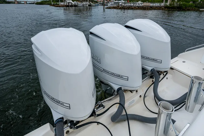 Bottoms Up II Yacht Photos Pics Triple Yamaha outboard engines on a 2009 Pursuit OS 375 Offshore boat.