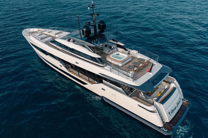 Randy Beth Yacht Photos Pics Luxurious 2018 Custom Line 120 yacht with jacuzzi, cruising on open sea.