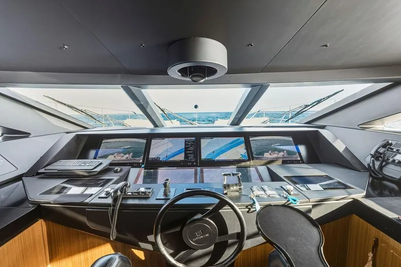 Randy Beth Yacht Photos Pics Helm of 2018 Custom Line 120 yacht with advanced navigation systems and ocean view.