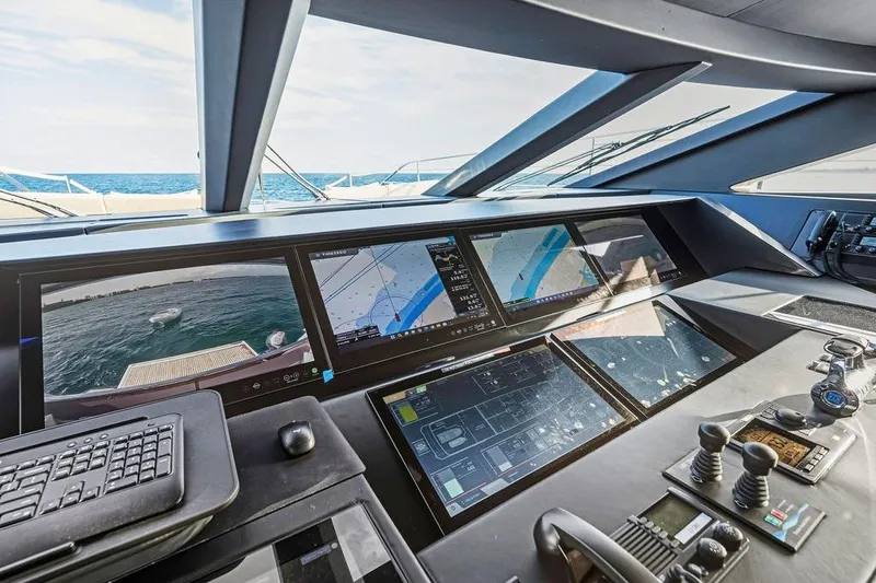 Randy Beth Yacht Photos Pics Control panel of 2018 Custom Line 120 yacht with advanced navigation screens.