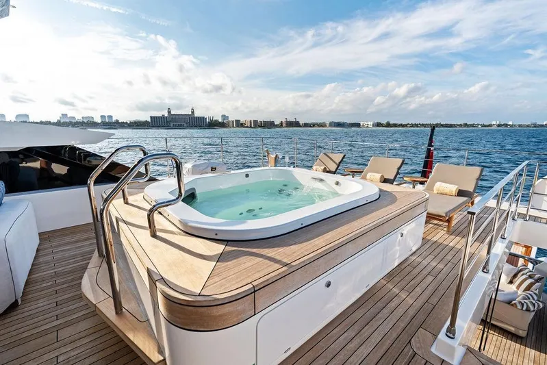 Randy Beth Yacht Photos Pics Luxurious 2018 Custom Line 120 yacht deck with jacuzzi and sun loungers.