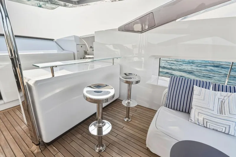 Randy Beth Yacht Photos Pics Luxurious 2018 Custom Line 120 yacht interior with modern bar and seating area.