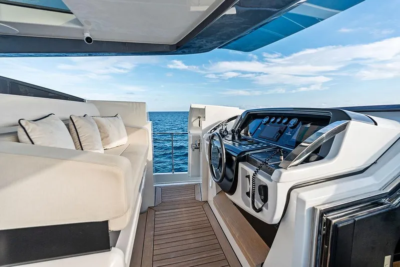 Randy Beth Yacht Photos Pics Luxurious 2018 Custom Line 120 yacht cockpit with plush seating and ocean view.