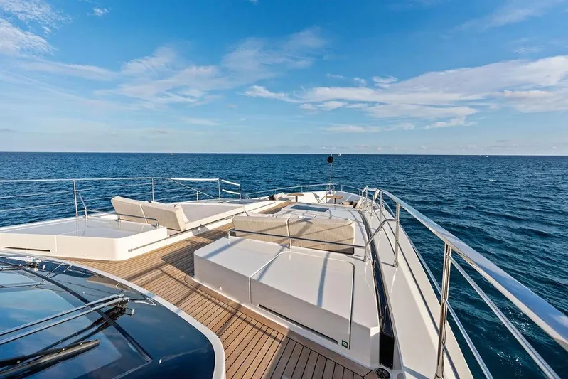 Randy Beth Yacht Photos Pics Luxurious 2018 Custom Line 120 yacht deck with ocean view and sun loungers.