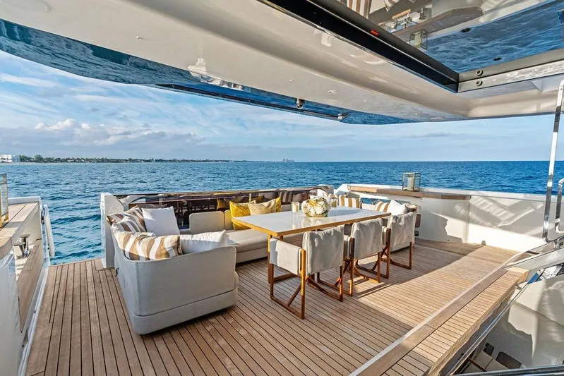 Randy Beth Yacht Photos Pics Luxurious 2018 Custom Line 120 yacht deck with elegant seating and ocean view.