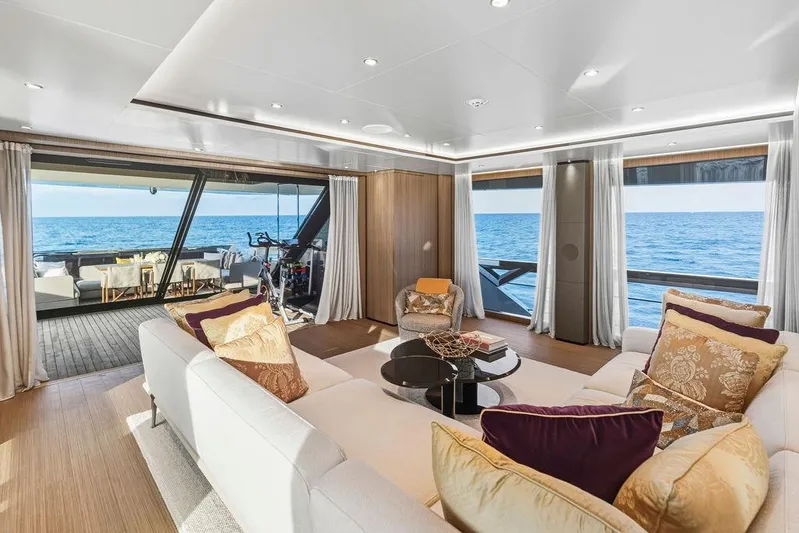 Randy Beth Yacht Photos Pics Luxurious yacht interior with ocean view, featuring elegant seating and modern decor, Custom Line 120, 2018.