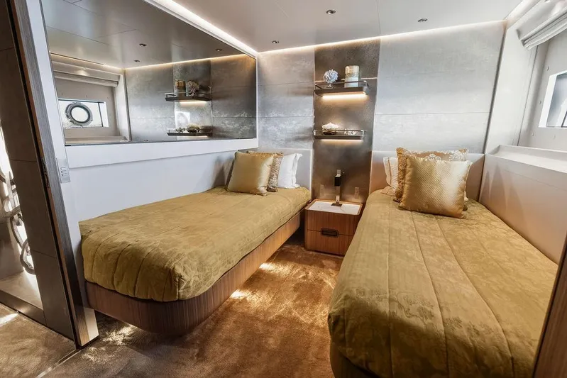 Randy Beth Yacht Photos Pics Luxurious 2018 Custom Line 120 yacht bedroom with twin beds and elegant decor.